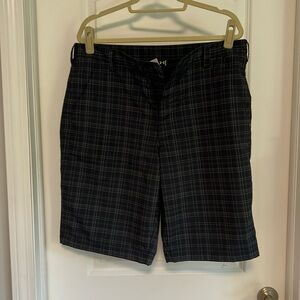 Men’s Under Armour black plaid shorts. Size 36.